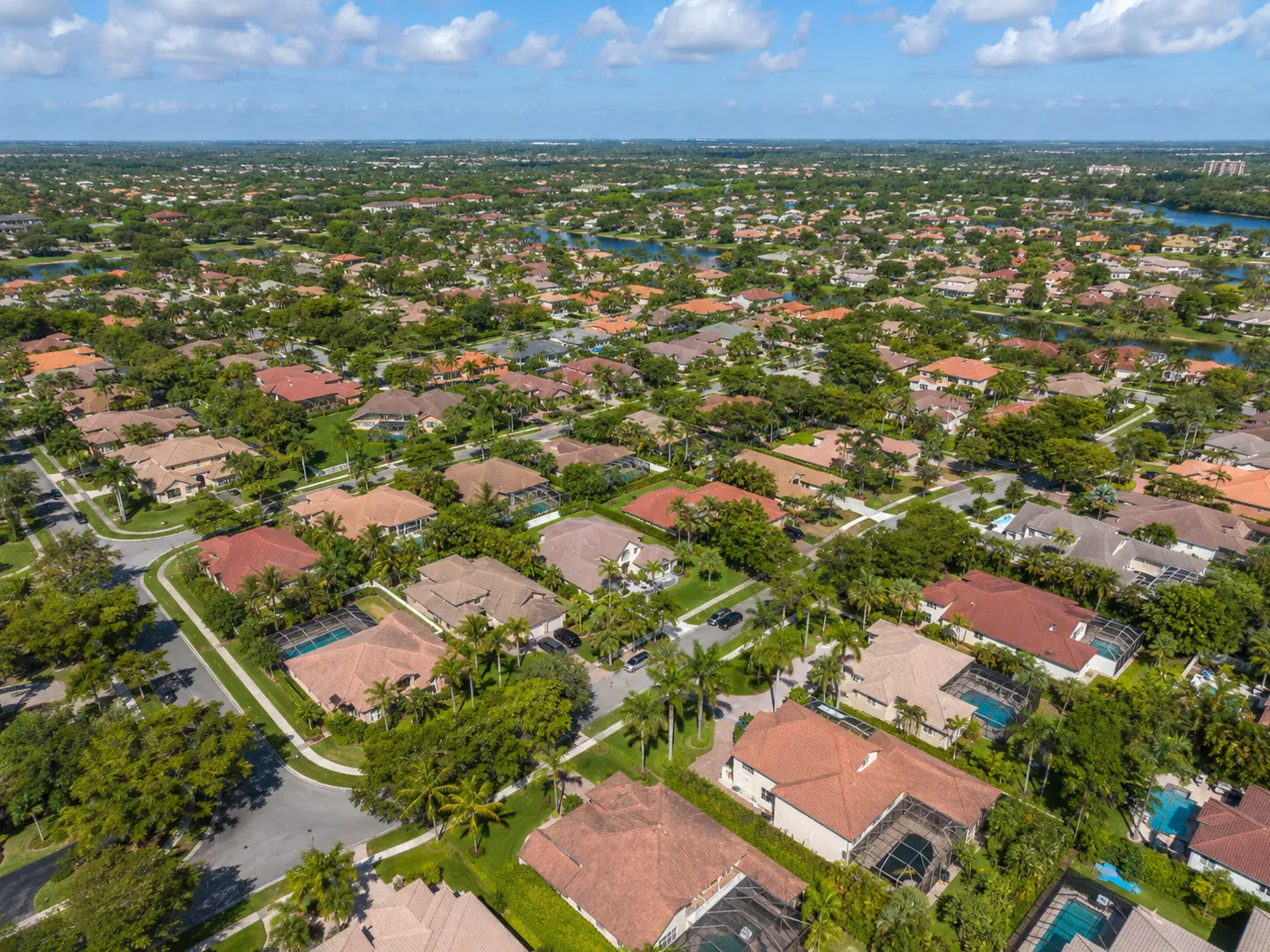 Aerial view of Coral Springs, Florida neighborhoods and tile roofs
